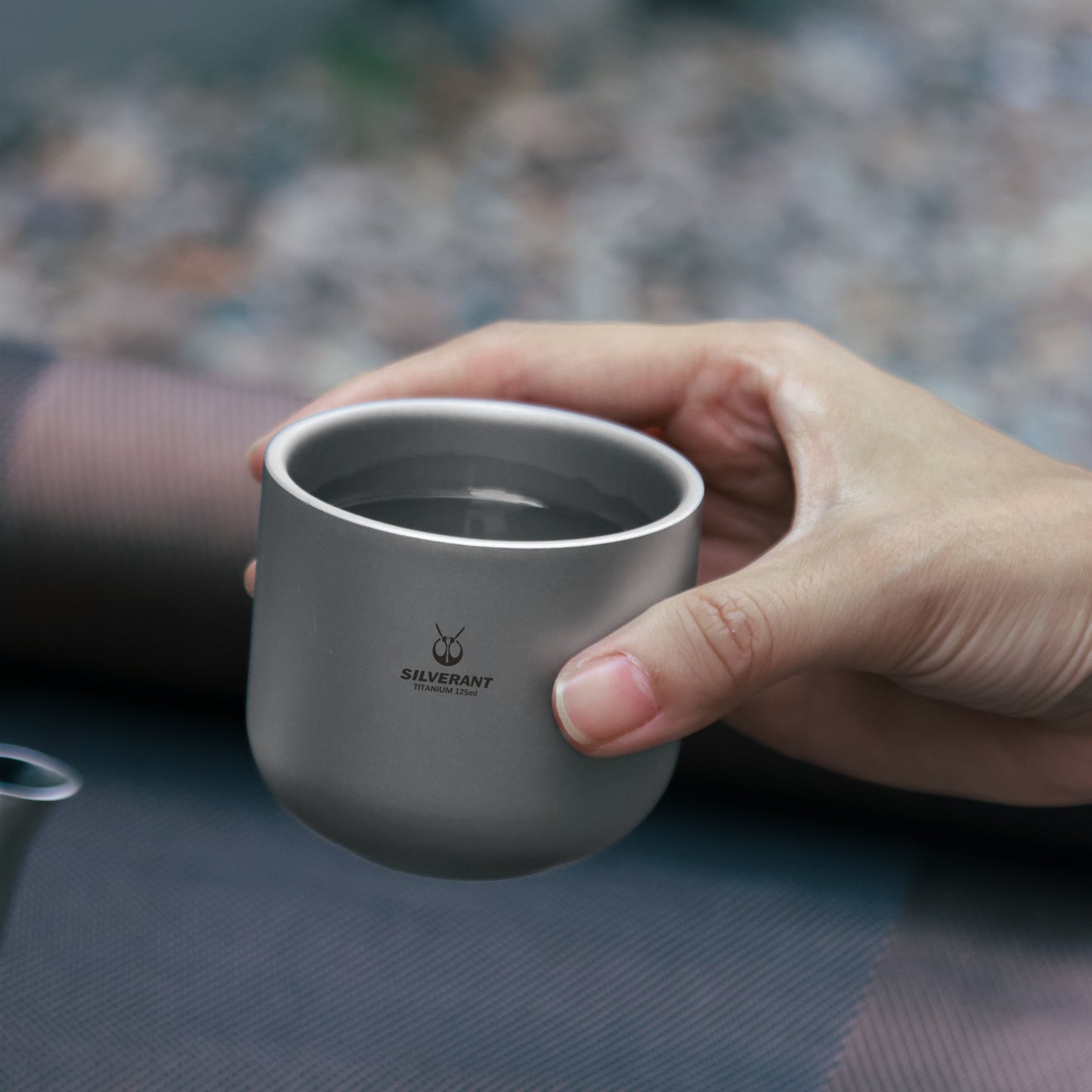 SilerAnt Outdoors Titanium Tea Cup Double Wall 125ml/4.22 fl oz Sandblasted Finish in -use image held in right hand