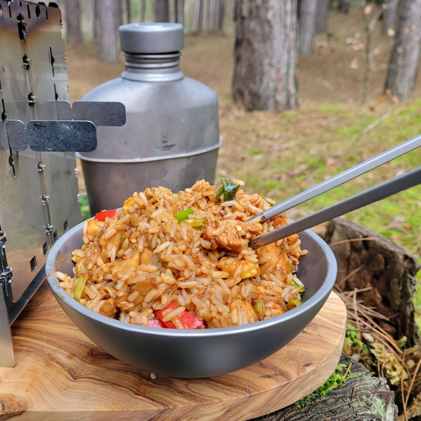SilverAnt titanium chopsticks inserted into a rice dish in a SilverAnt titanium double-wall bowl.