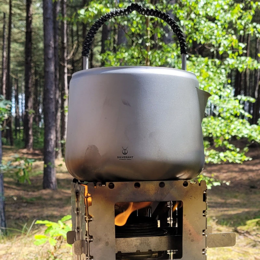 
                  
                    Large Titanium Kettle 1400ml/49 fl oz - boiling water on a bushbox
                  
                