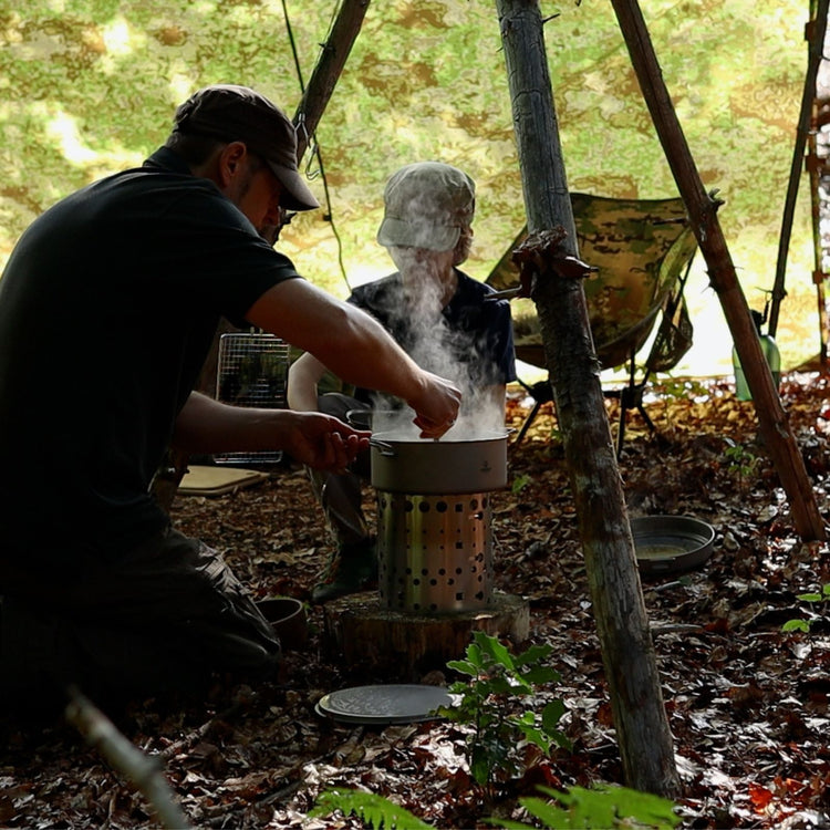 
                  
                    Large 2-Piece Titanium Camping Cookware Set With Hanger - cooking in the pot
                  
                