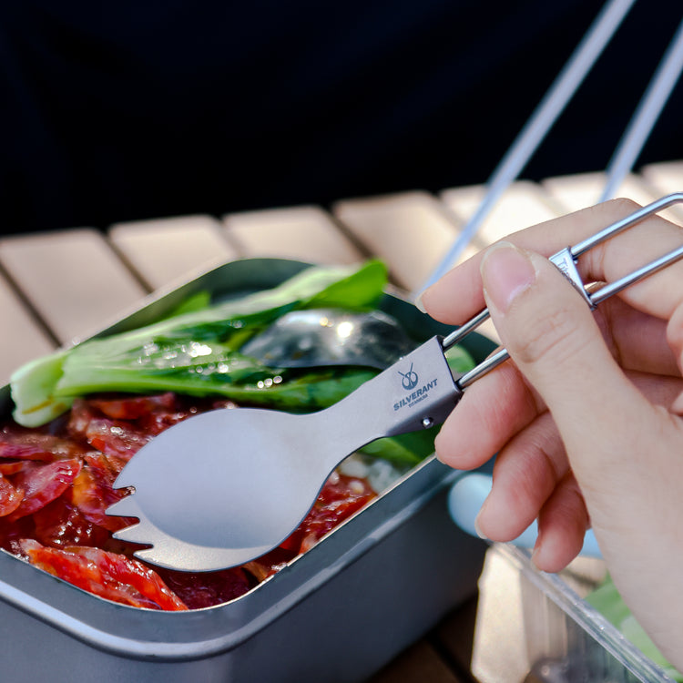 
                  
                    Ultralight Titanium Folding Spork with sandblasted finish extended to its full length
                  
                