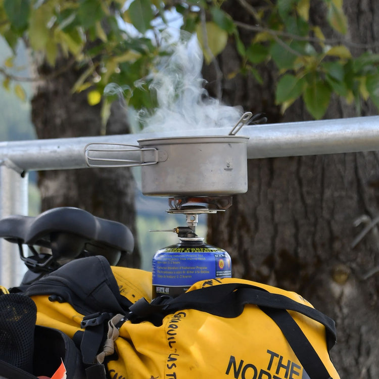 
                  
                    Ultralight 2-Piece Titanium Cookware Set - in use image- cooking in the pot
                  
                