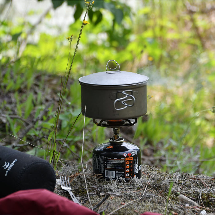 
                  
                    Ultralight 2-Piece Titanium Cookware Set in use picture - boiling water in the pot
                  
                