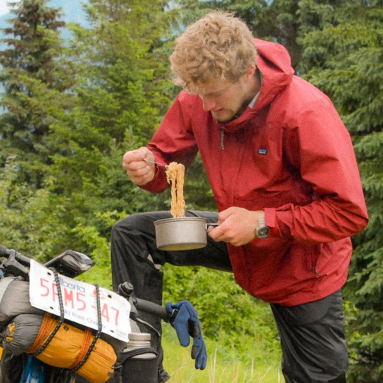 
                  
                    Ultralight 2-Piece Titanium Cookware Set in use image - eat noodles from the pot
                  
                