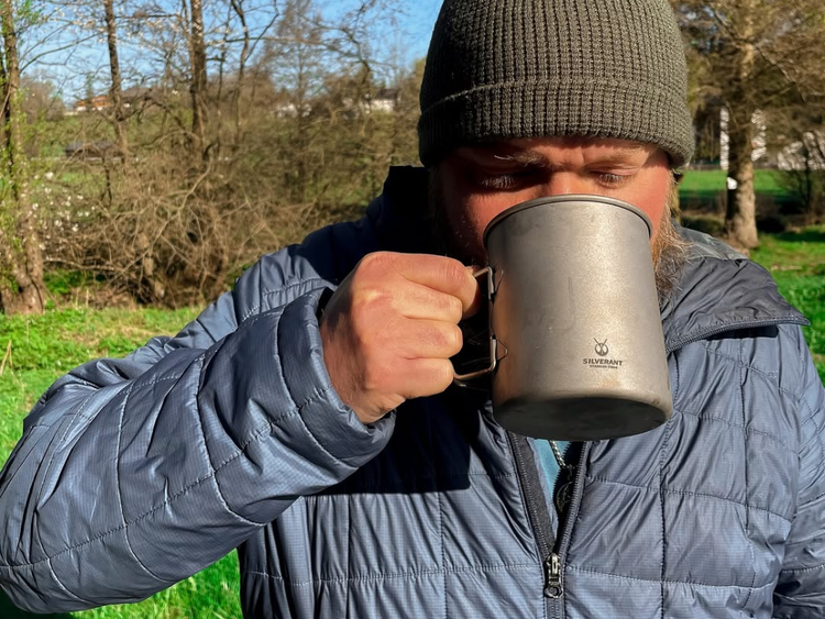 Man drinking from a mug, How did you find us?