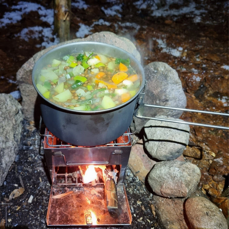 
                  
                    SilverAnt Medium 2-Piece Titanium Pot and Pan Camping Cookware Set 1600ml/54.1 fl oz - In-Use (Cooking vegetables, wood stove, winter camping, snow, stew, titanium camping pot, foldable handles)
                  
                