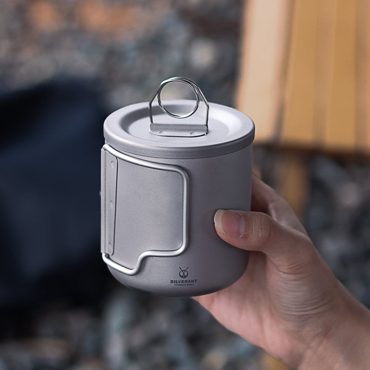 SilverAnt Titanium Double Wall Mug 300ml/10.14fl oz  - with folding handles - Actual product photo, on hand, lifestyle shot, real life still