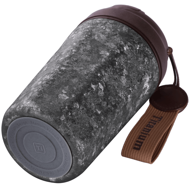 
                  
                    SilverAnt Ultralight Crystallized Titanium Insulated Travel Coffee Mug with Lid 400ml/14 fl oz Black Crystallized - Laid down its side, bottom shown
                  
                