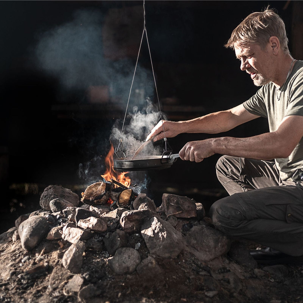 SilverAnt Ultralight Extra Large 2-Piece Titanium Camping Cookware Set With Hanger - In-Use (cooking in the frying pan above the campfire)
