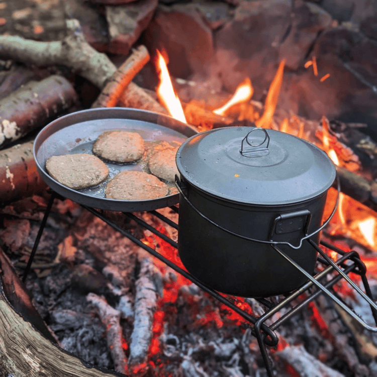 
                  
                    SilverAnt Ultralight Large Titanium Camping Pot with Lid & Bail Handle 2L/67.63 fl oz - In-use (cooking over fire, titanium plates cooking burgers, outdoor cooking, camp cooking)
                  
                