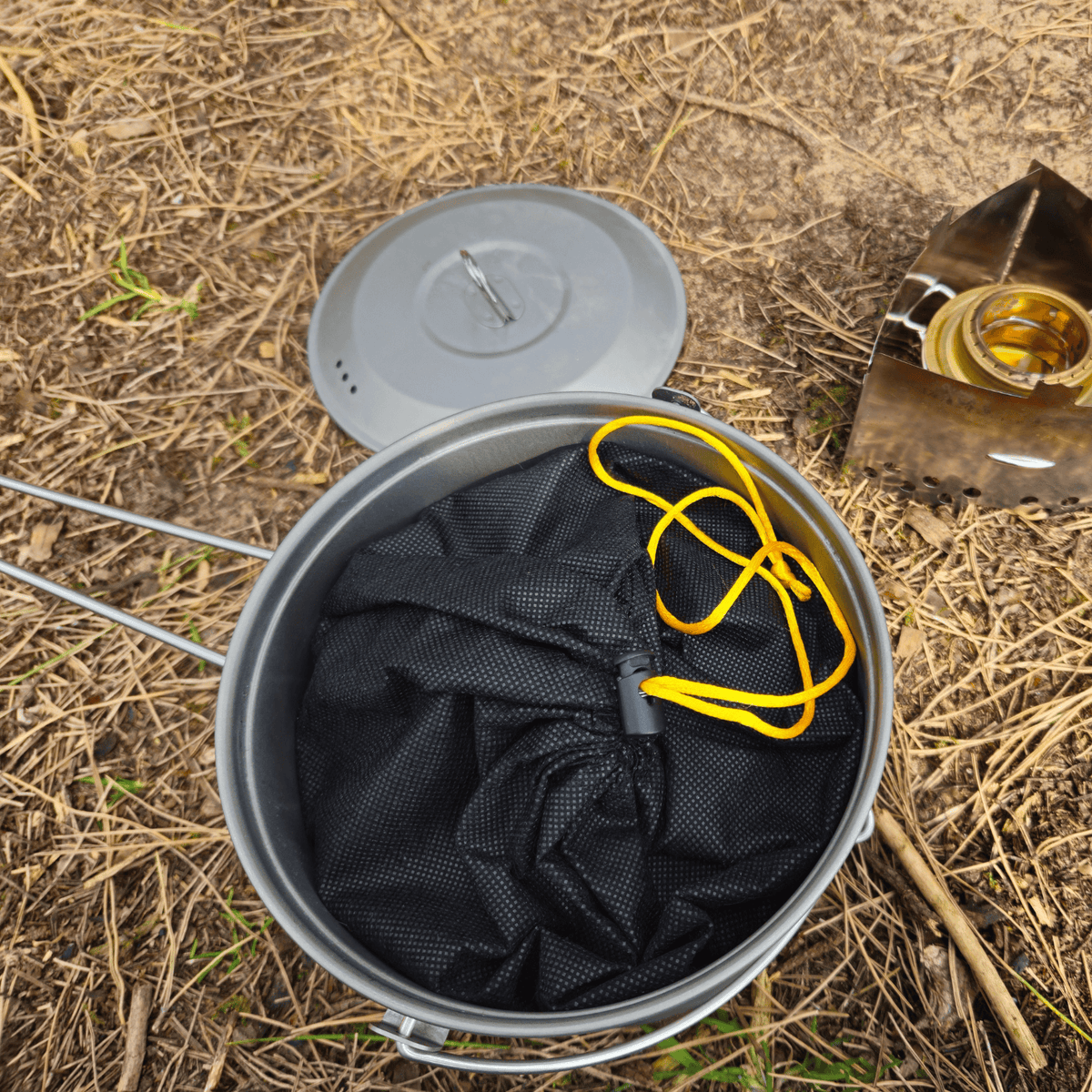 SilverAnt Ultralight Large Titanium Camping Pot with Lid & Bail Handle 2L/67.63 fl oz - In-Use (opening 3-Piece Cookware Set outdoors from nesting position)