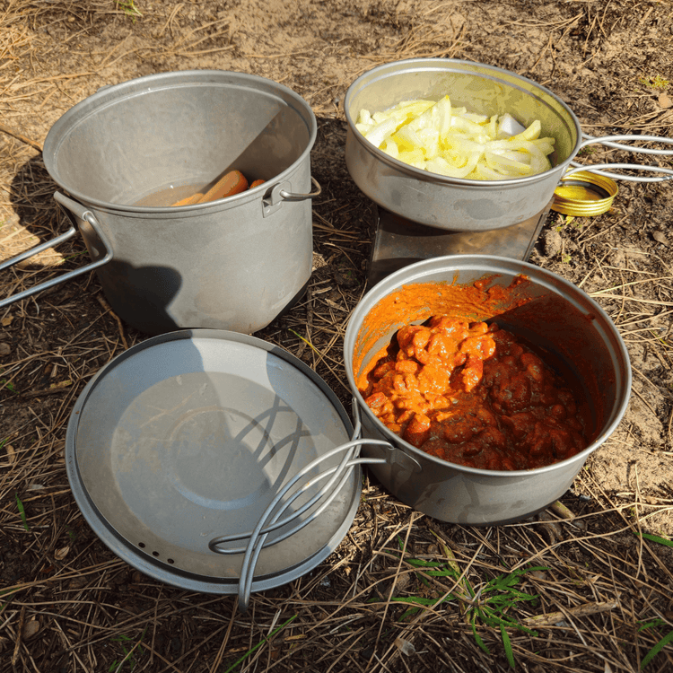 
                  
                    SilverAnt Ultralight Large Titanium Camping Pot with Lid & Bail Handle 2L/67.63 fl oz - SilverAnt Ultralight 3-Piece Titanium Cookware Set In-Use (camp cooking)
                  
                