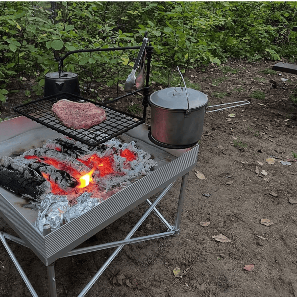 SilverAnt Ultralight Large Titanium Camping Pot with Lid & Bail Handle 2L/67.63 fl oz - In-Use (cooking outdoors)