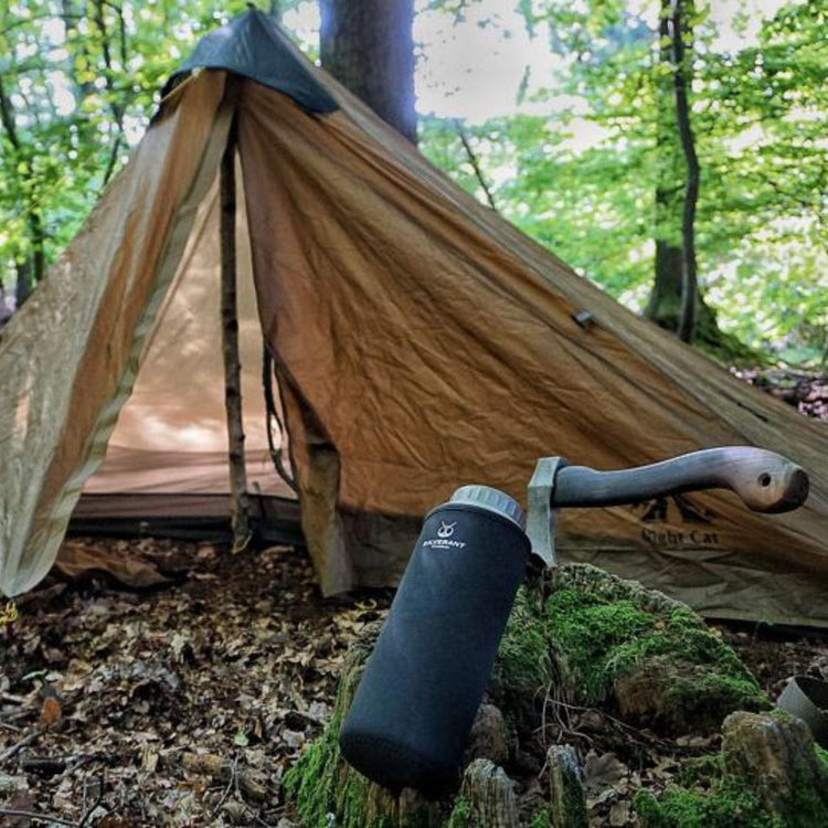 
                  
                    SilverAnt Ultralight Large Titanium Water Bottle (Wide Mouth) - In-Use (Actual product photo, outdoors, camping tent in background, forest camping)
                  
                