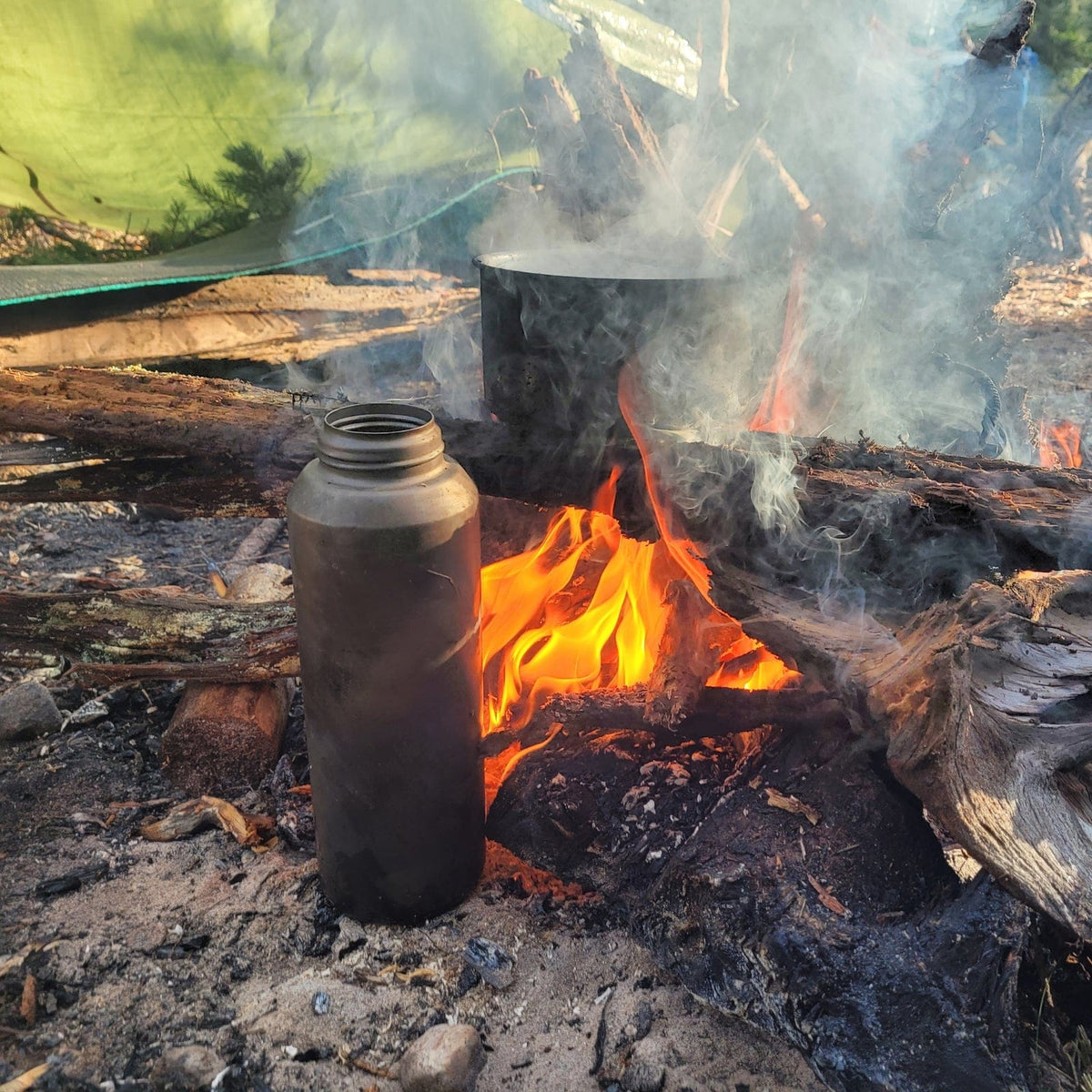 SilverAnt Ultralight Large Titanium Water Bottle With Titanium Cup - In-Use (actual product photo, boiling water, patina)