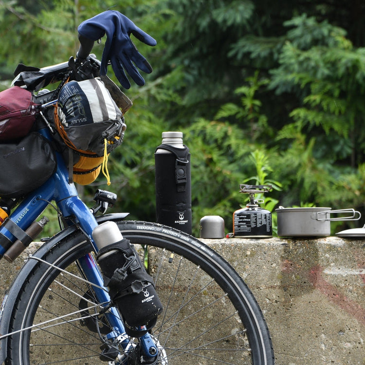 
                  
                    SilverAnt Ultralight Large Titanium Water Bottle With Titanium Cup - In-Use (Actual product photo, lifestyle shot, bike, bikepacking, camping, outdoors, unscrewed)
                  
                