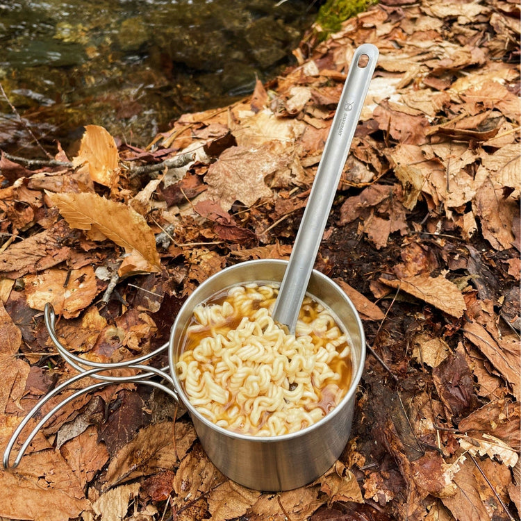 
                  
                    SilverAnt Ultralight Long Handle Titanium Spork Sandblasted - Actual product photo, real life use, in use, used to eat noodles, falll hiking, autumn leaves
                  
                