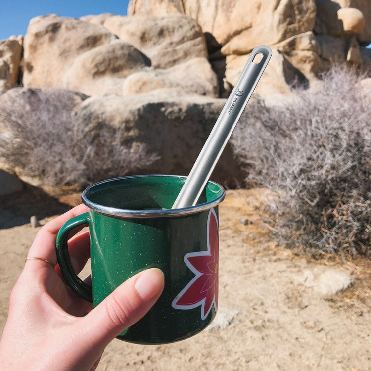 
                  
                    SilverAnt Ultralight Long Handle Titanium Spork Sandblasted - Actual product photo, real life use, in-use, in a green mug, day camping
                  
                