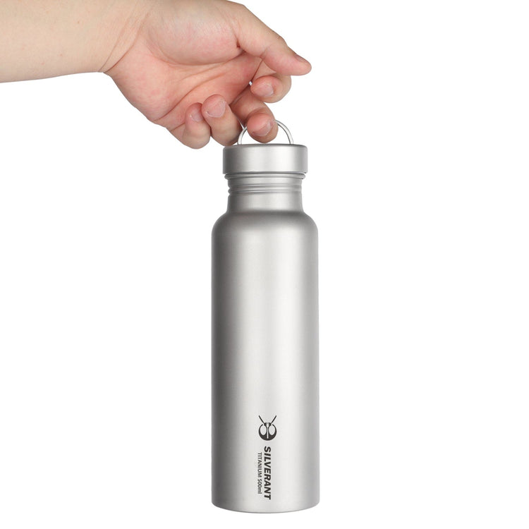 
                  
                    SilverAnt Ultralight Round Titanium Water Bottle - 500ml held by lid's loop handle
                  
                