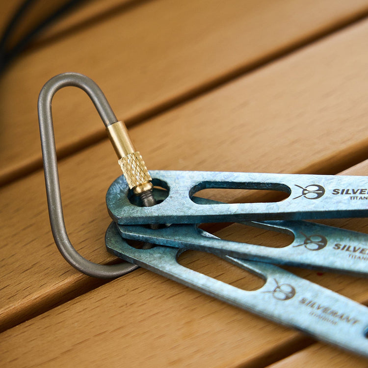 
                  
                    SilverAnt Ultralight Titanium 3-Piece Cutlery Set (Kinfe, Fork, and Spoon) Anodized Blue - actual product photo, close-up of carabiner hook, silverant branding
                  
                