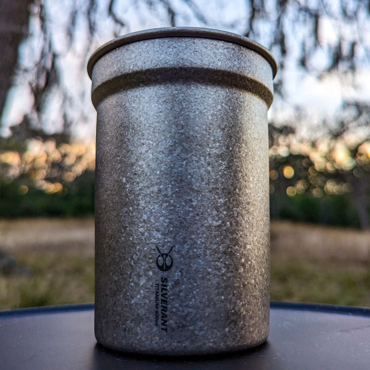 
                  
                    SilverAnt Ultralight Titanium Beer Cup 400ml/14fl oz - Actual product photo, real life still, lifestyle shot, close-up bottom angle view of beer cup's crystallized finish
                  
                