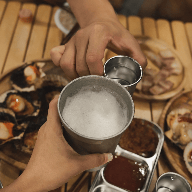 
                  
                    SilverAnt Ultralight Titanium Beer Cup 400ml/14fl oz - Actual product photo, real life still, lifestyle shot, camp dinner scene
                  
                