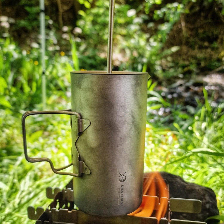 
                  
                    SilverAnt Ultralight Titanium Coffee French Press Sandblasted - Actual product photo, lifestyle shot, in use, boiling coffee directly over fire, patina
                  
                