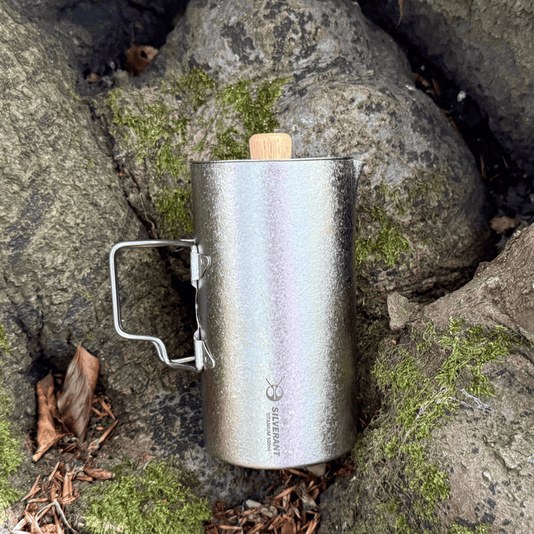
                  
                    SilverAnt Ultralight Titanium Coffee French Press Crystallized - Actual product photo, lifestyle shot, laid down on mossy rocks
                  
                