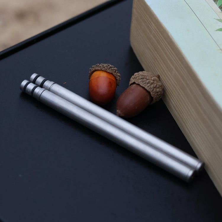 
                  
                    SilverAnt Ultralight Titanium Collapsible Folding Travel Chopsticks - actual product photo, real life use, lifestyle shot, collapsed position
                  
                