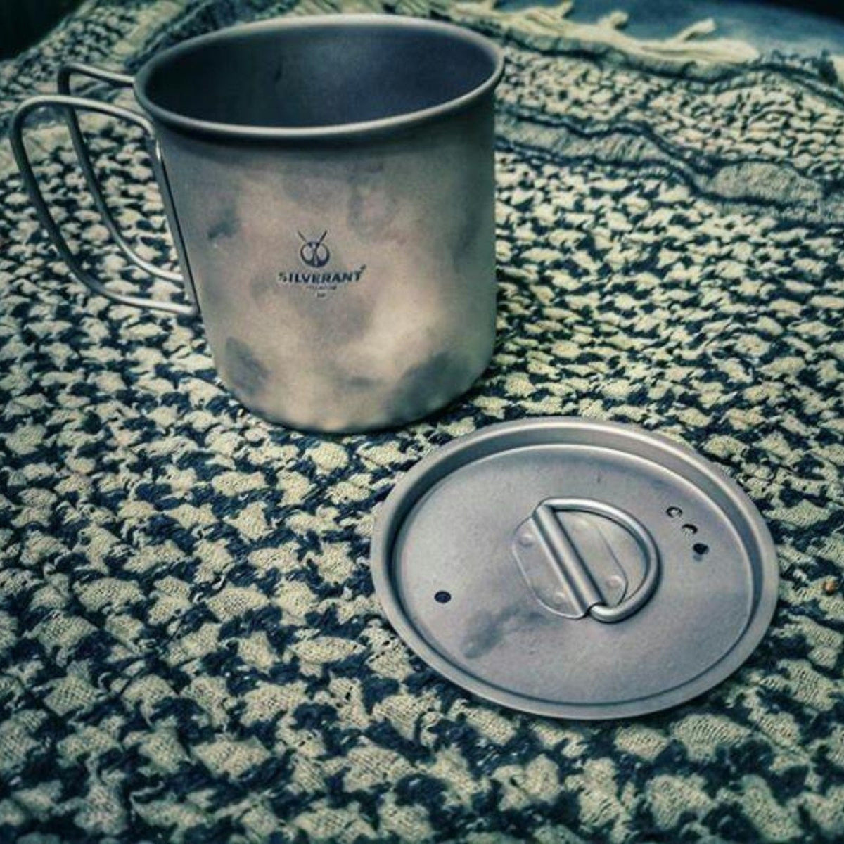 SilverAnt Ultralight Titanium Cup With Lid 4 Sizes - 400ml - Actual product photo, placed on a clothed flat surface, lifestyle shot