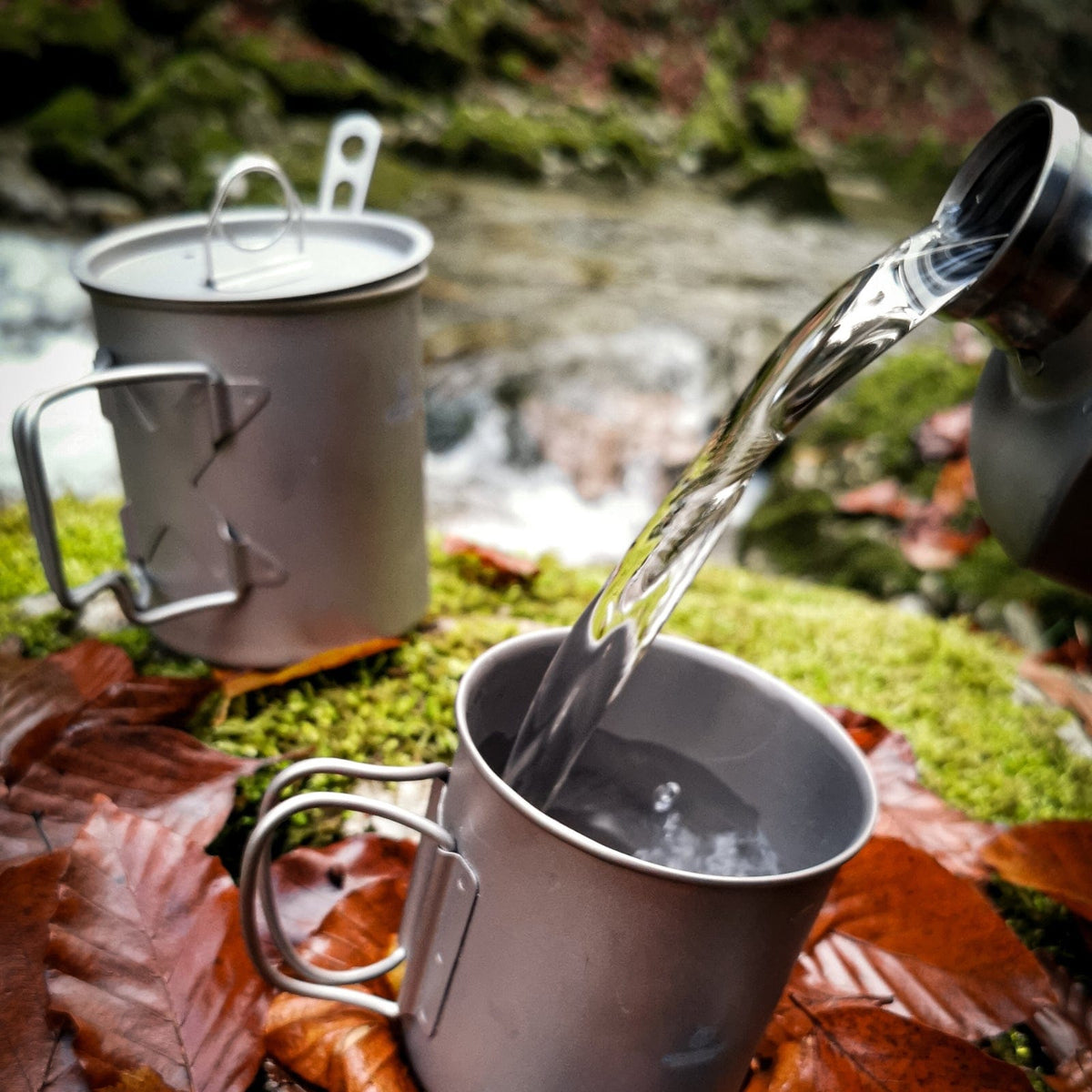 SilverAnt Ultralight Titanium Cup With Lid 4 Sizes - 500ml - Real life still, lifestyle shot, pouring water onto cup