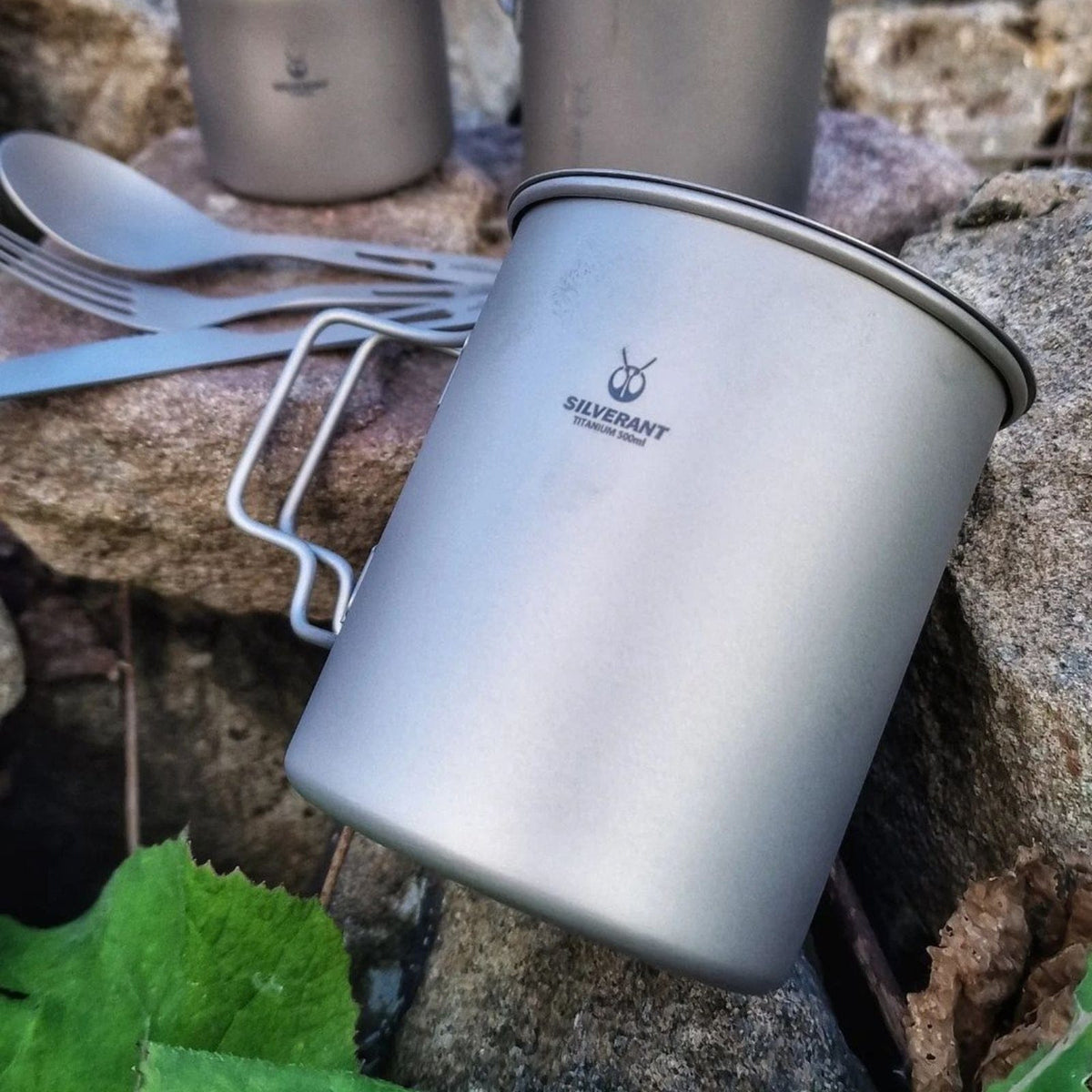 SilverAnt Ultralight Titanium Cup With Lid 4 Sizes - 500ml - Actual product photo, close-up, laid down on a rock, close-up of finish