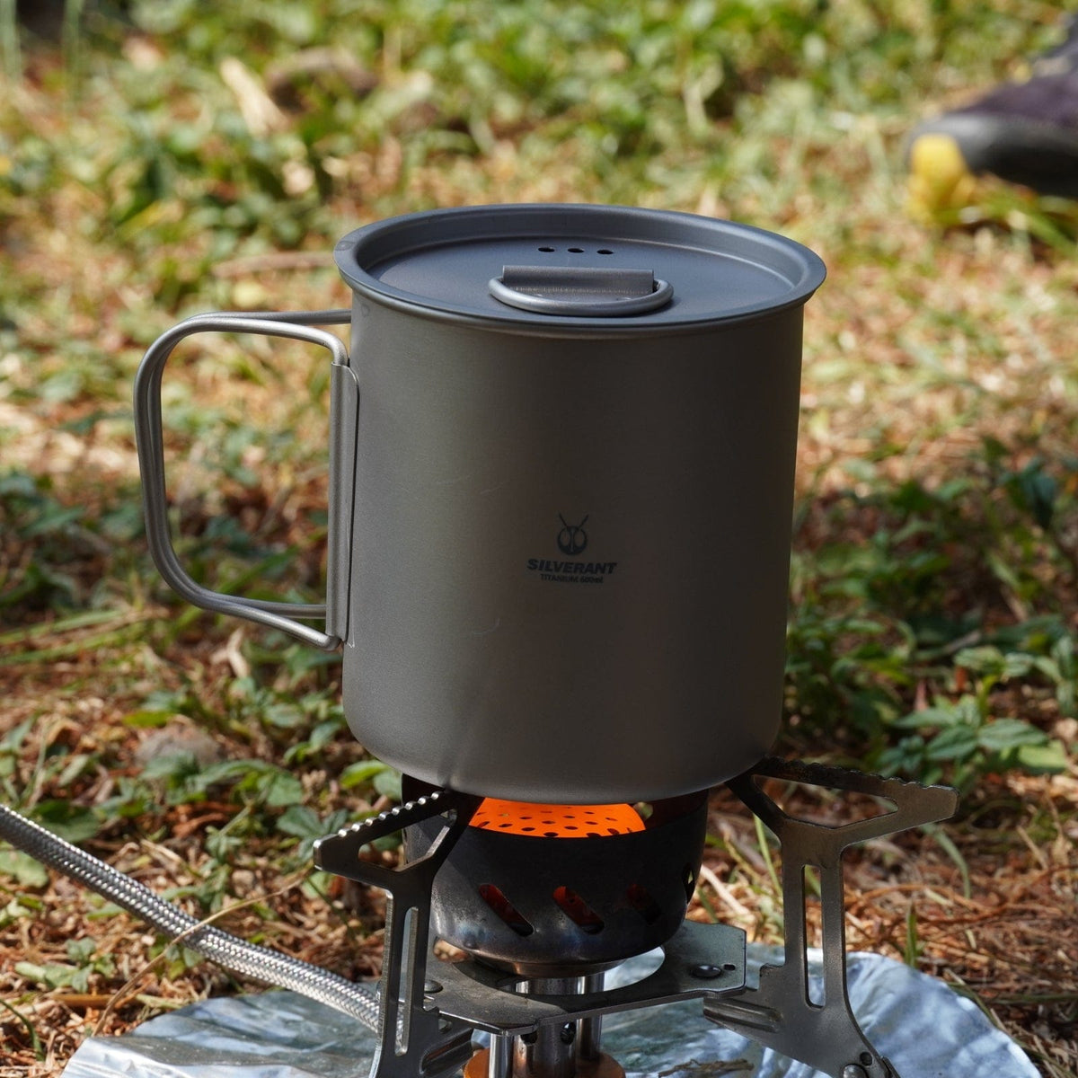 SilverAnt Ultralight Titanium Cup With Lid 4 Sizes - 600ml - Actual product photo, real life still, in use, cooking, camp cooking, lifestyle shot