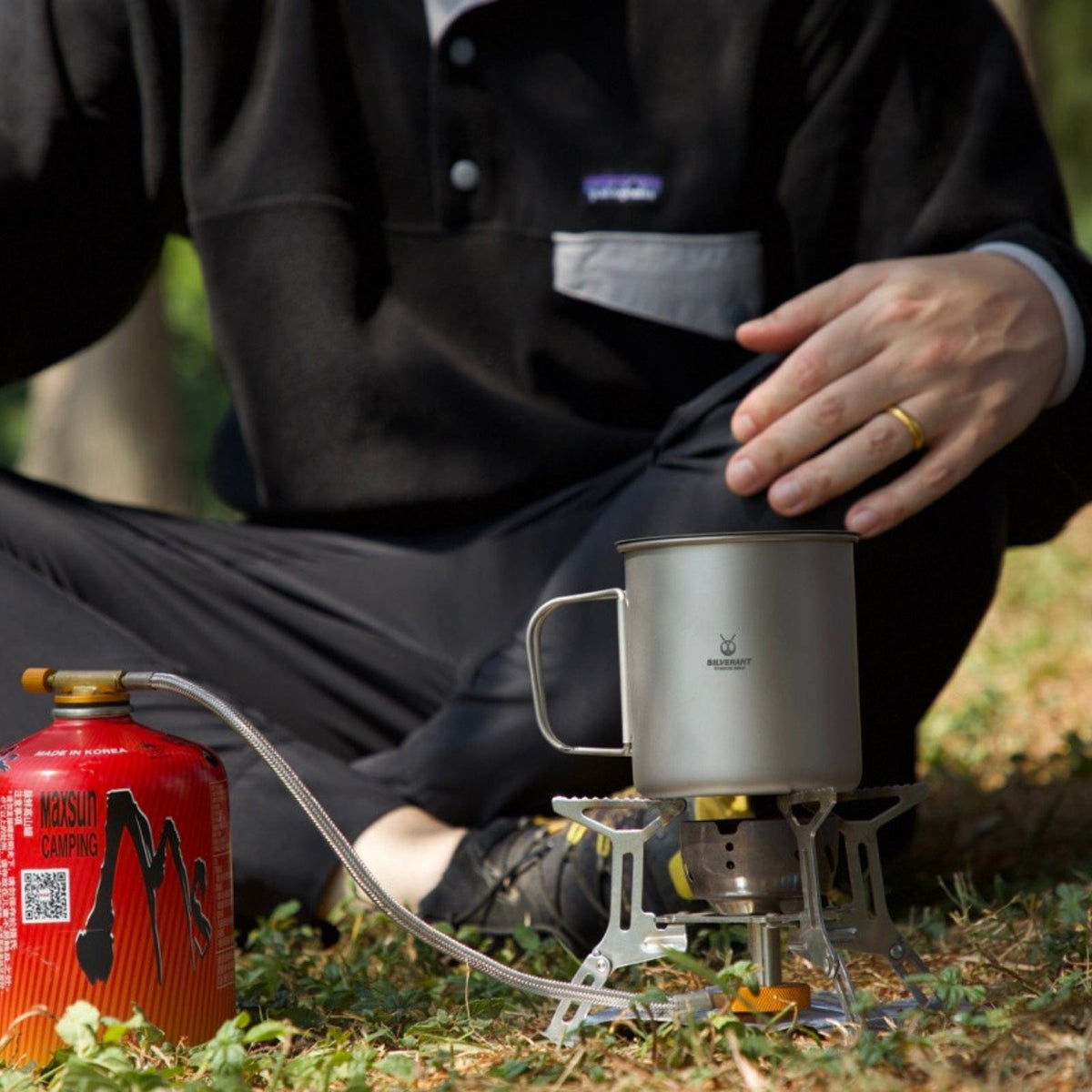 SilverAnt Ultralight Titanium Cup With Lid 4 Sizes - 600ml - Actual product photo, real life still, in use, cooking, camp cooking, lifestyle shot