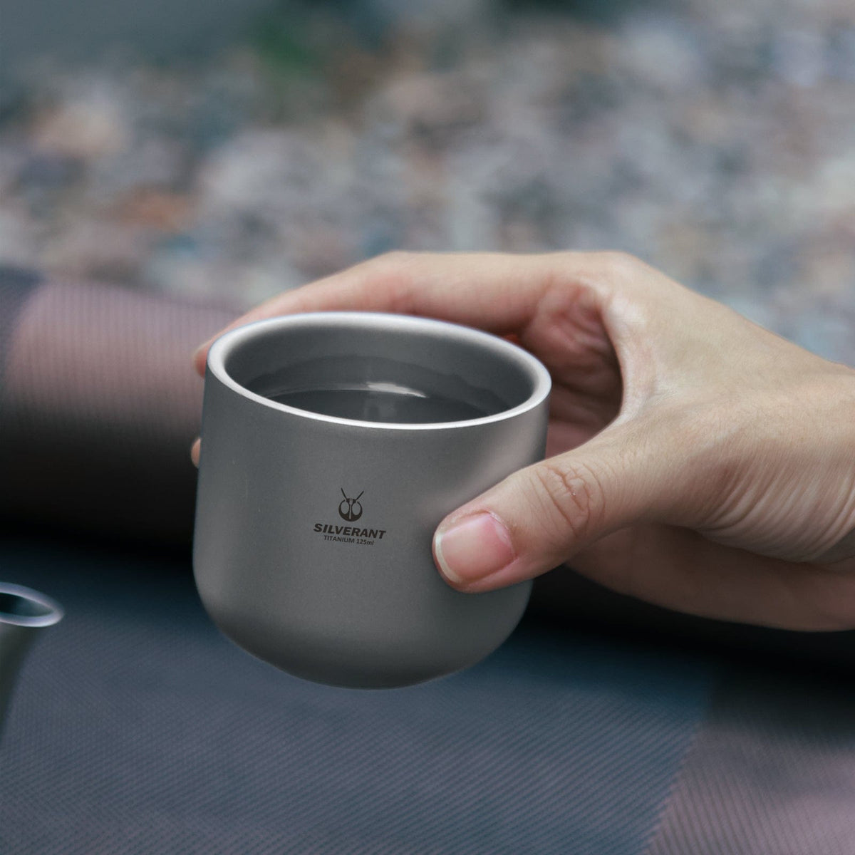 SilerAnt Outdoors Titanium Tea Cup Double Wall 125ml/4.22 fl oz Sandblasted (in-use, actual product photo, held in right hand, on-hand)