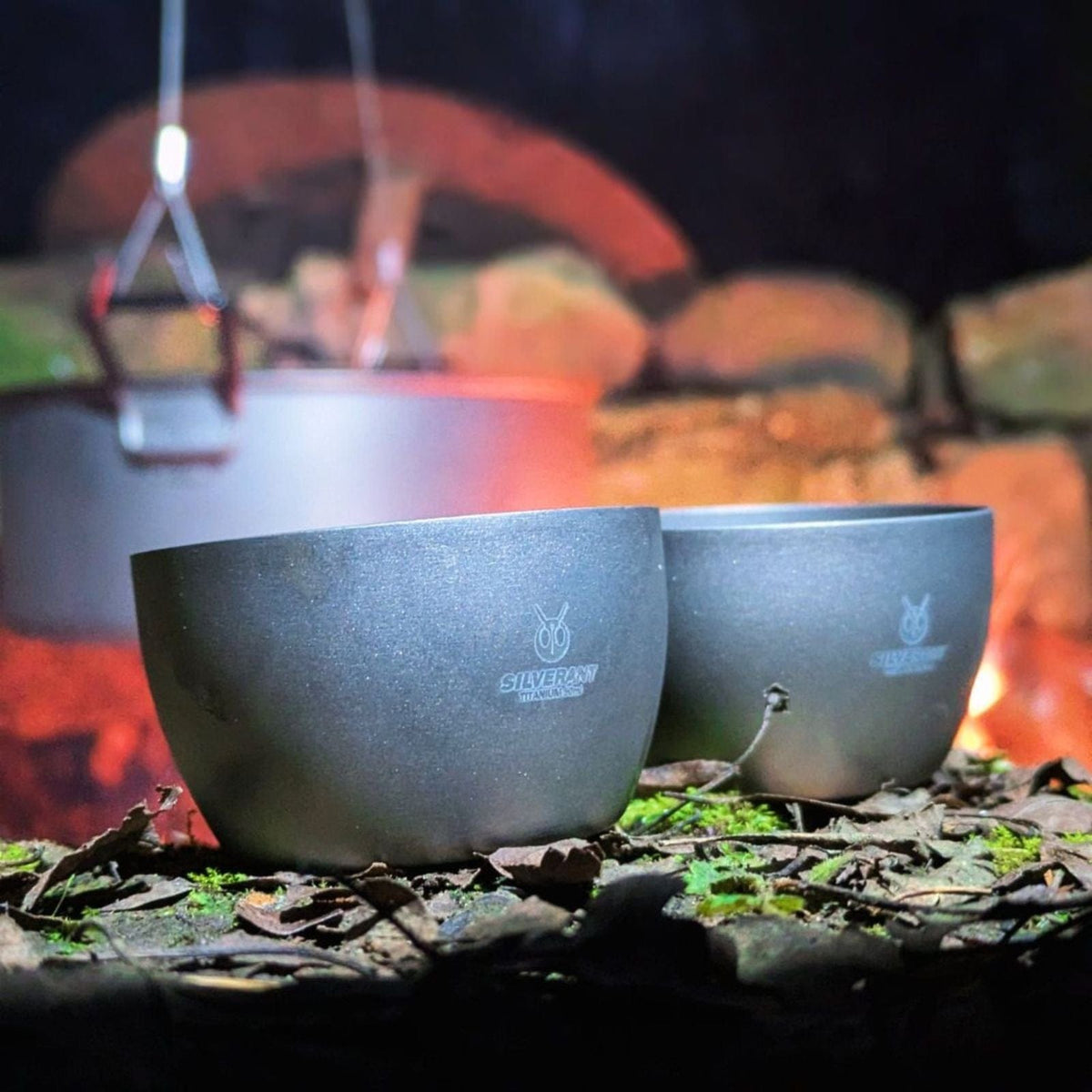 SilverAnt Ultralight Titanium Hip Flask 450ml/15.22 fl oz & Shot Glasses - Actual product photo, close-up, real life still, with hanging pot in the background