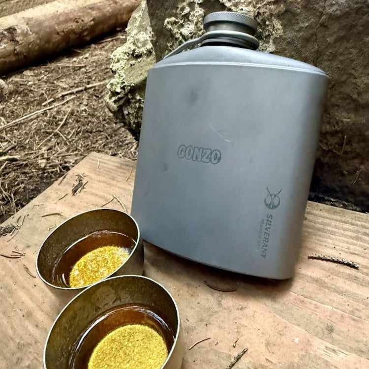 
                  
                    SilverAnt Ultralight Titanium Hip Flask & Funnel - 300ml/10.5 fl oz Sandblasted Finish (actual product photo, real life use)
                  
                