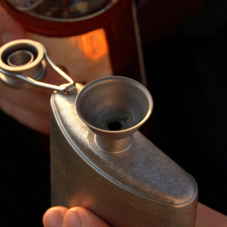 
                  
                    SilverAnt Titanium Hip Flask and Funnel 248ml/8.73 fl oz crystallized finish - with a funnel on its mouth
                  
                