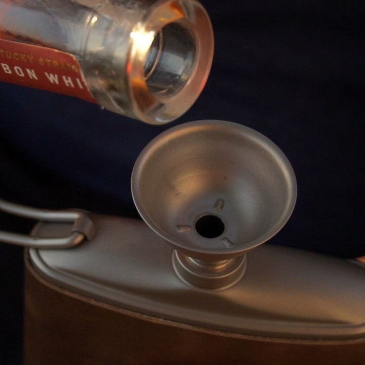 
                  
                    SilverAnt Outdoors Titanium Hip Flask and Funnel 248ml/8.73 fl oz with PU leather with the funnel on
                  
                