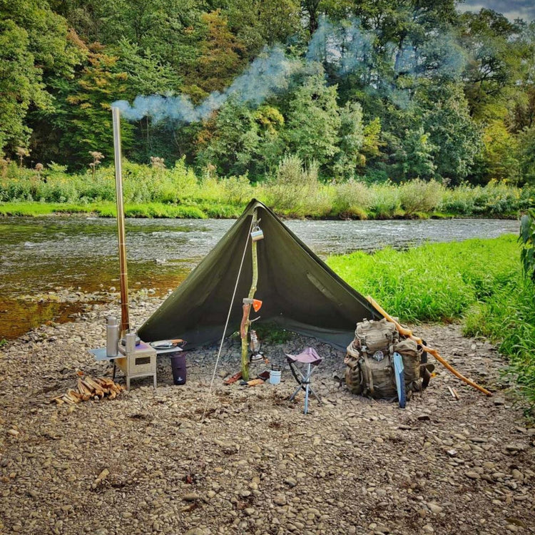 
                  
                    SilverAnt Ultralight Titanium Large Foldable Wood Burning Stove - Actual product photo, propped up and set-up on side of tent
                  
                