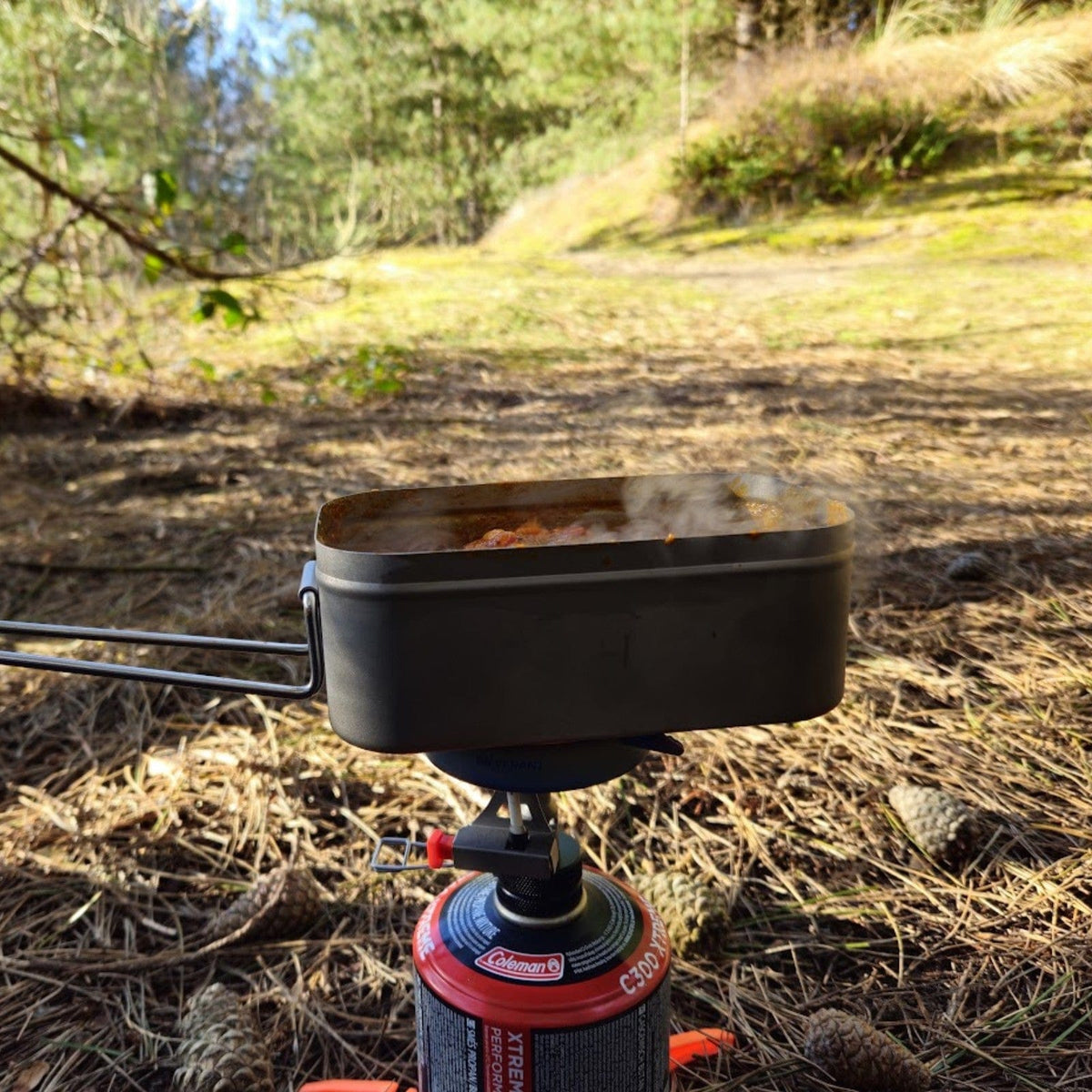 SilverAnt Ultralight Titanium Mess Tins - In-Use (Placed on top of SilverTi gas stove, forest background)