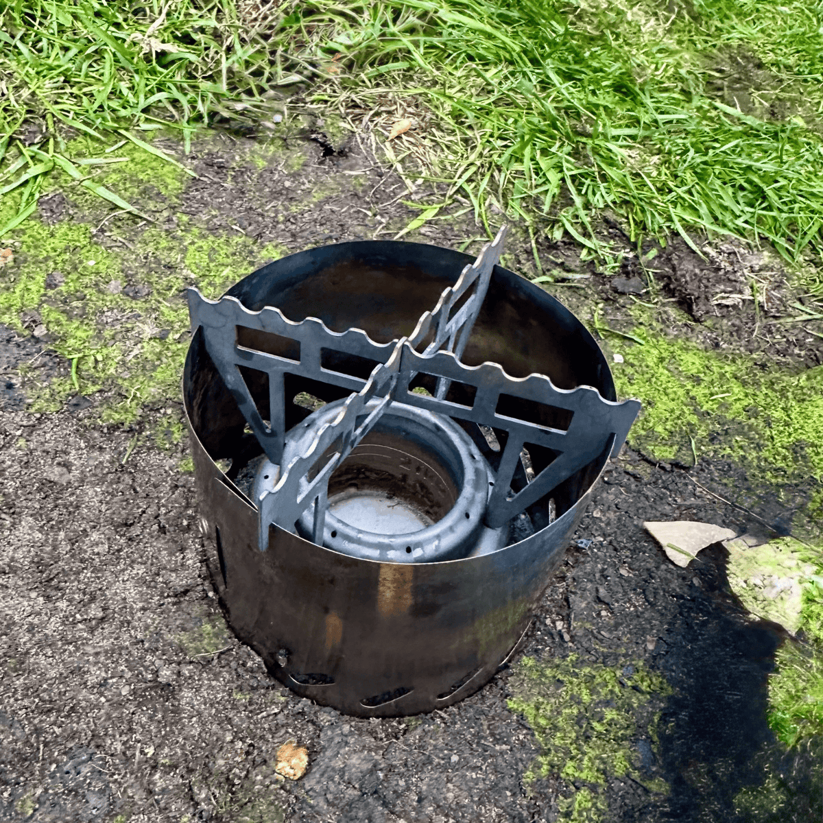 SilverAnt Ultralight Titanium Multi-Fuel Alcohol Stove Kit - actual product photo in-camping, top angle view tilted