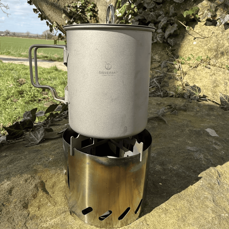 
                  
                    SilverAnt Ultralight Titanium Multi-Fuel Stove & Cup Kit - In-Use (plains, grassy setting, cooking) with SilverAnt Ultralight Titanium Cup With Lid 4 Sizes 500ml
                  
                