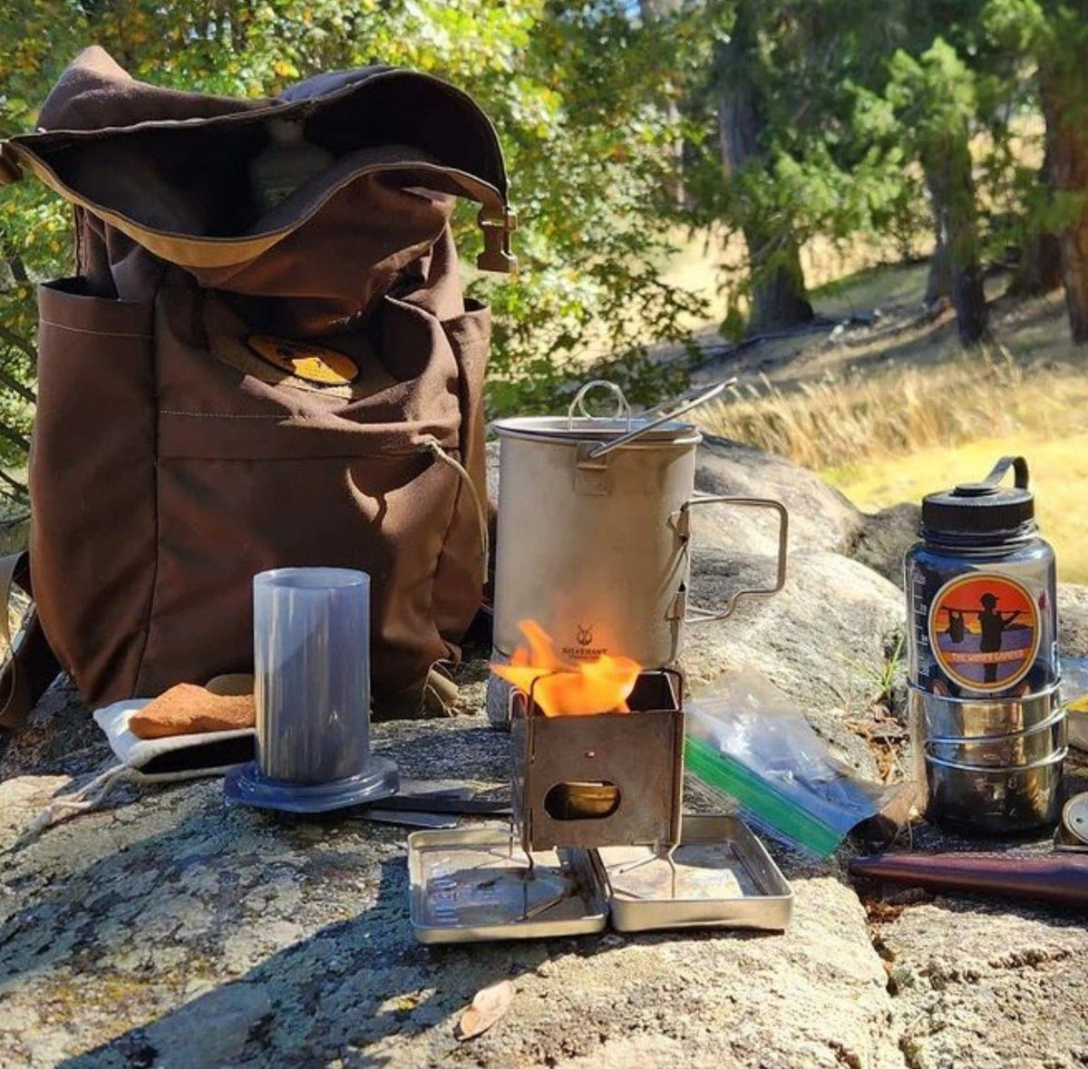 SilverAnt Ultralight Titanium Pot 750ml/25 fl oz with Lid and Bail Handle - In-Use (Cooking on top of rock, backpack, forest camping, fire stove)