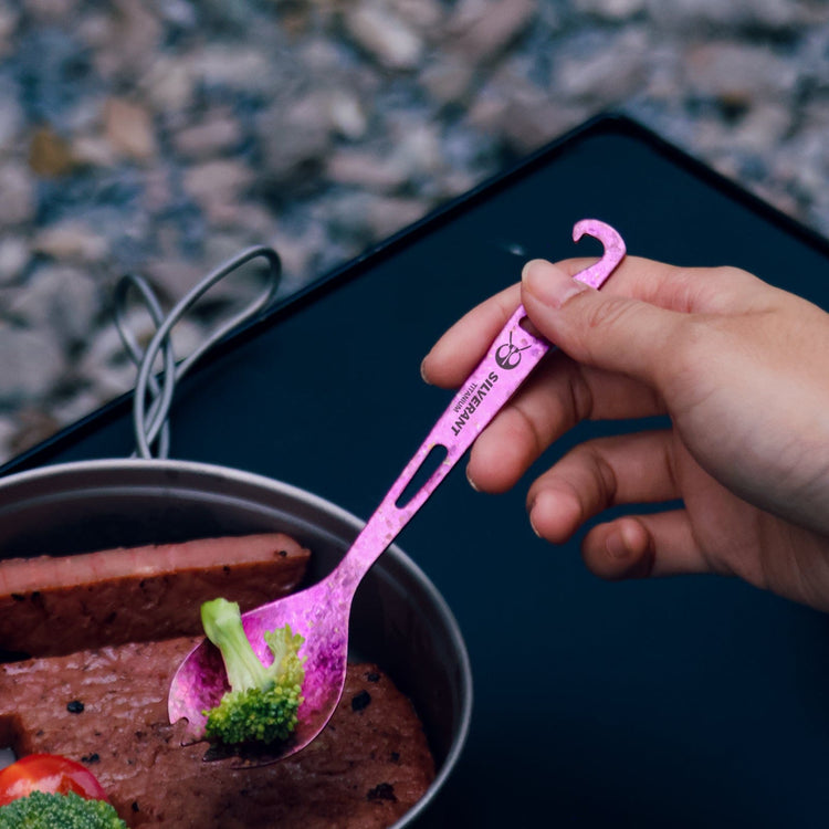 
                  
                    SilverAnt Ultralight Titanium Spork with Bottle Opener Anodized Purple - actual product photo, real life use, in use, on hand
                  
                