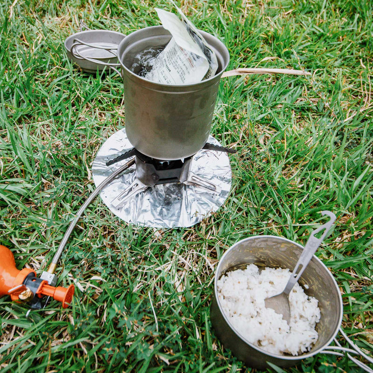 
                  
                    SilverAnt Ultralight Titanium Spork with Bottle Opener - actual product photo, real life use, in use
                  
                