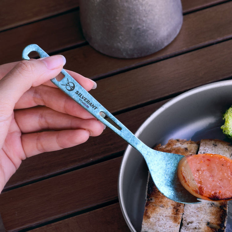 
                  
                    SilverAnt Ultralight Titanium Spork with Bottle Opener Anodized Blue - actual product photo, in use, real life setting
                  
                