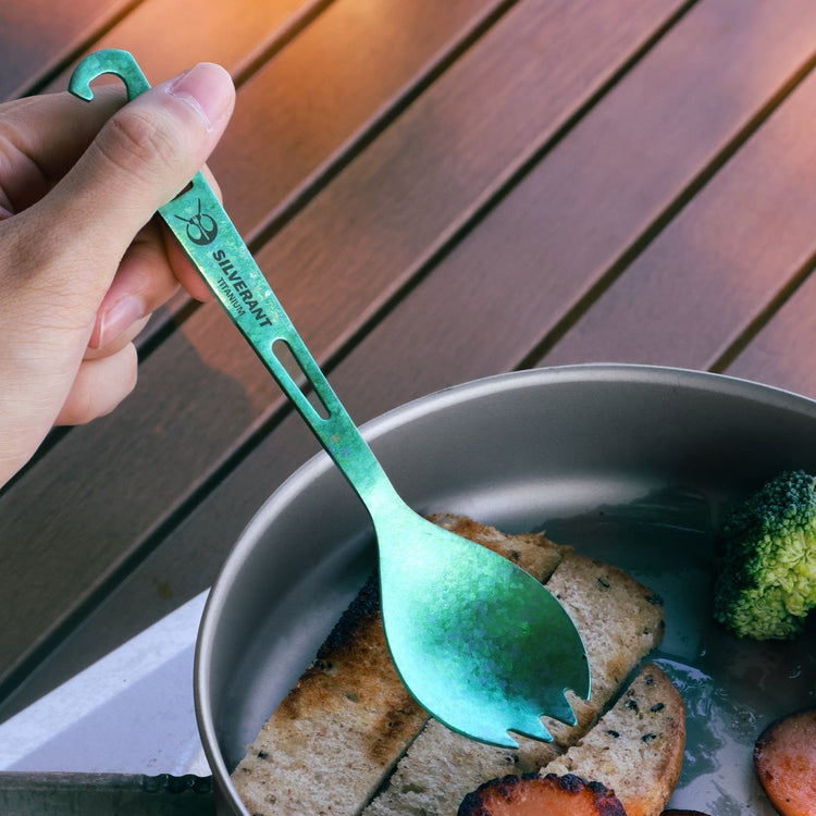 
                  
                    SilverAnt Ultralight Titanium Spork with Bottle Opener Anodized Green - actual product photo, on-hand, in-use, real life setting, lifestyle shot
                  
                
