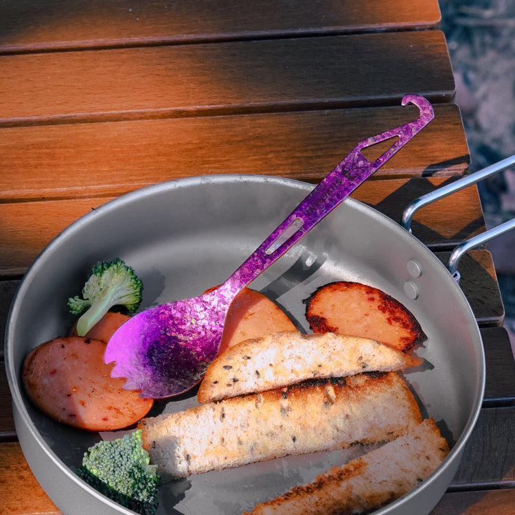 
                  
                    SilverAnt Ultralight Titanium Spork with Bottle Opener Anodized Purple - actual product photo, real life, in use, lifestyle shot
                  
                