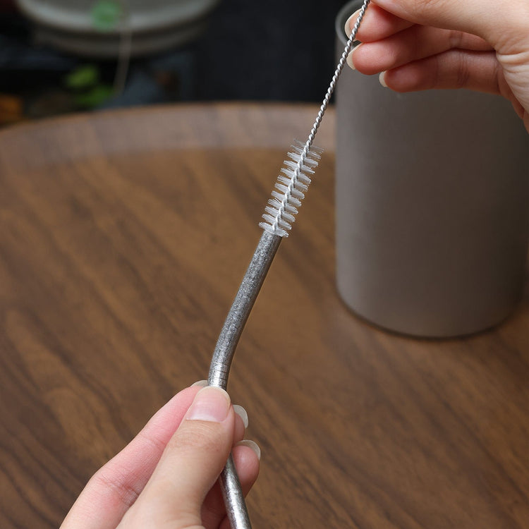 
                  
                    SilverAnt Ultralight Titanium Straw Crystallized - Actual product photo, being cleaned with straw cleaner included with purchase
                  
                